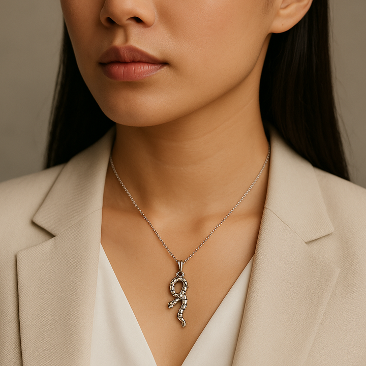 Mystic Serpent Charm: Handcrafted Silver-Colored Brass Snake Pendant