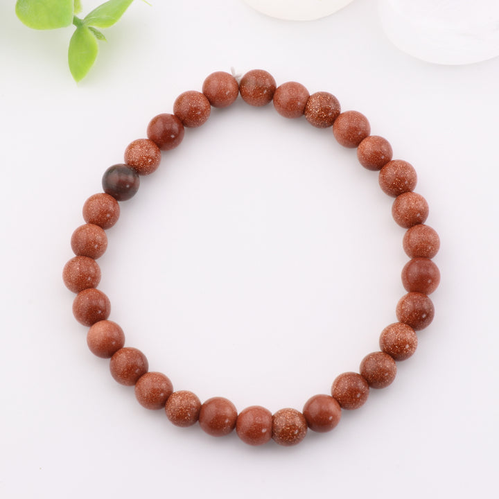 Pulsera de piedra dorada roja natural, cuentas de 6 mm sin metal: ¡refuerza tu energía! Accesorio de lujo.
