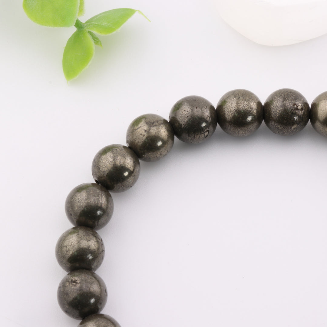 Pulsera de pirita natural de 8 mm: lujosa joya de brillo dorado con piedras preciosas energizantes.