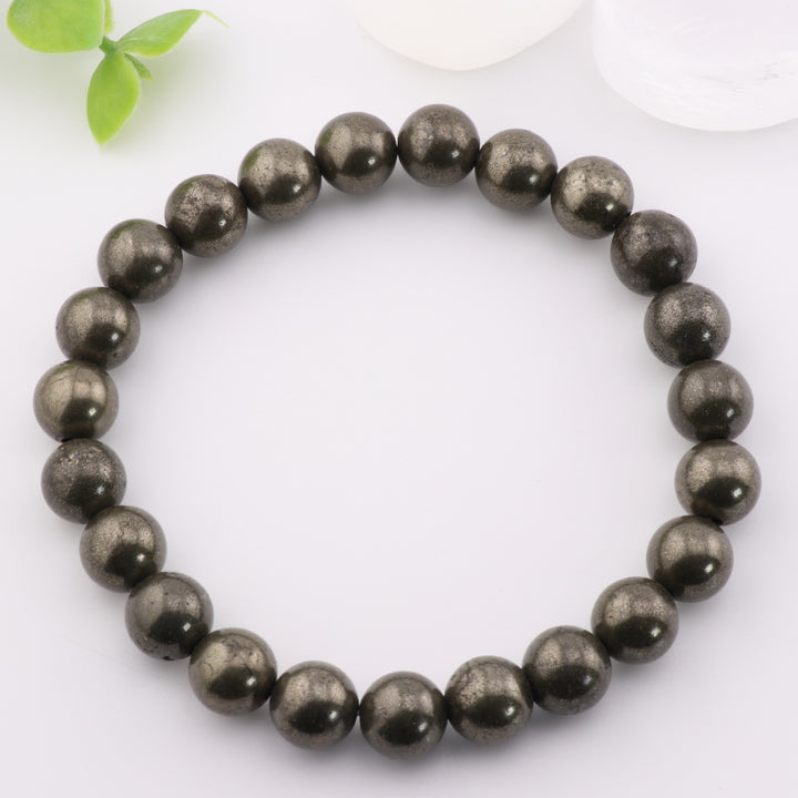Pulsera de pirita natural de 8 mm: lujosa joya de brillo dorado con piedras preciosas energizantes.