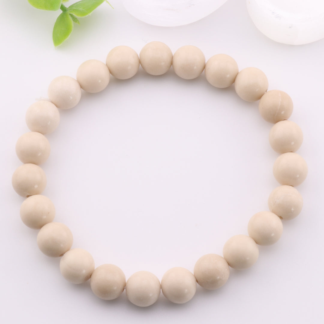 Pulsera de coral teñido fosilizado natural (8 mm) - Sin metal - Gema oceánica única