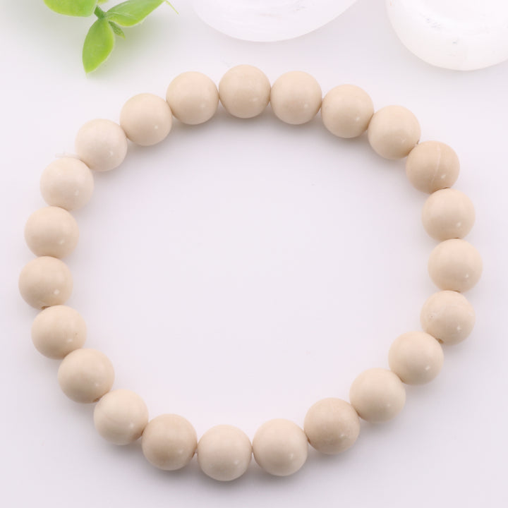 Pulsera de coral teñido fosilizado natural (8 mm) - Sin metal - Gema oceánica única