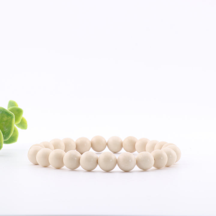 Pulsera de coral teñido fosilizado natural (8 mm) - Sin metal - Gema oceánica única
