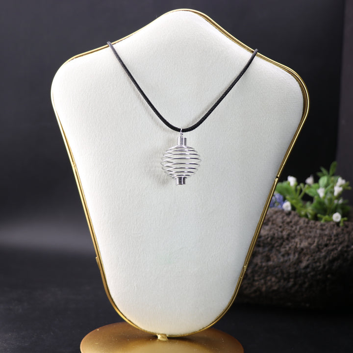 Handcrafted Metal Wire Pendant – Elegance with a Twist of Artistry