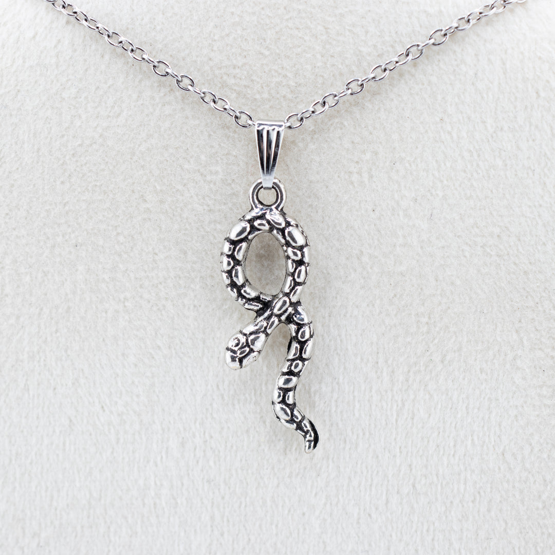 Mystic Serpent Charm: Handcrafted Silver-Colored Brass Snake Pendant