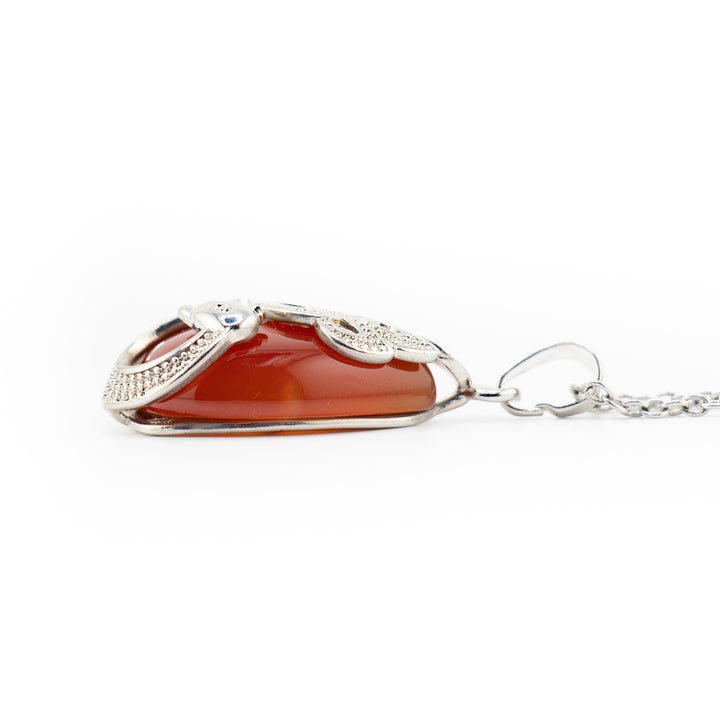 Collar de lágrima artesanal: piedra preciosa de cornalina natural con motivo de pavo real