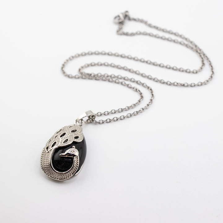 Pendentif en agate noire en forme de larme, fabriqué à la main, inspiré du paon