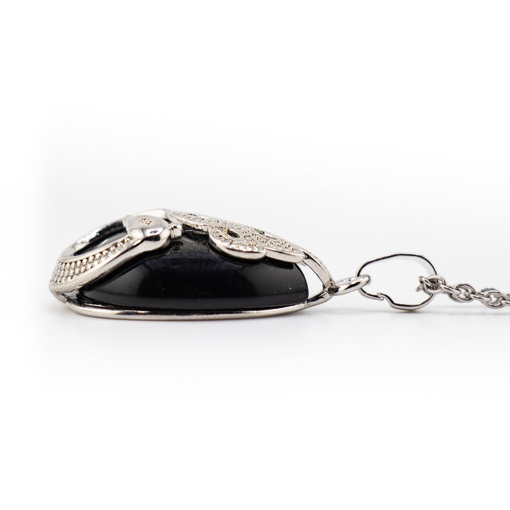 Pendentif en agate noire en forme de larme, fabriqué à la main, inspiré du paon