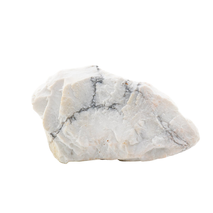 A rough crystal specimen of howlite, characterized by its white color with natural gray veining.
