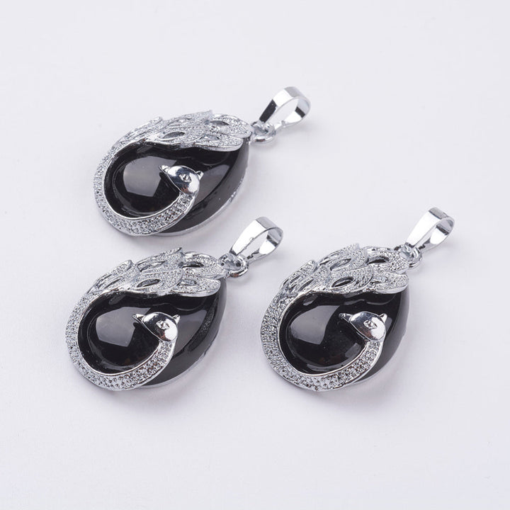 Pendentif en agate noire en forme de larme, fabriqué à la main, inspiré du paon