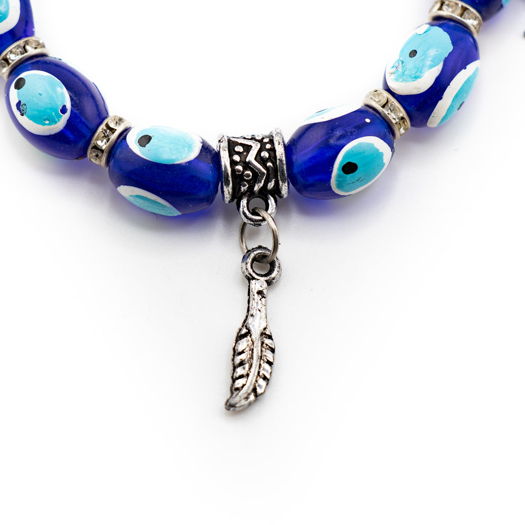 Bracelet de protection Nazar - Mauvais œil - Argenté avec perles et breloques en plastique teinté, 8 mm
