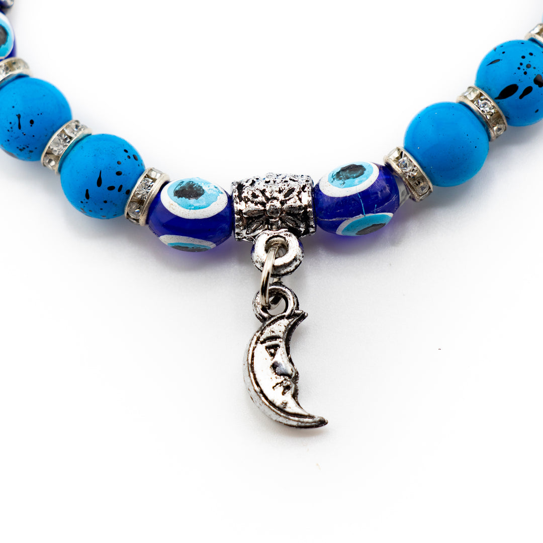 Bracelet teinté contre le mauvais œil, perle bleue de protection et nazar argenté, 8 mm