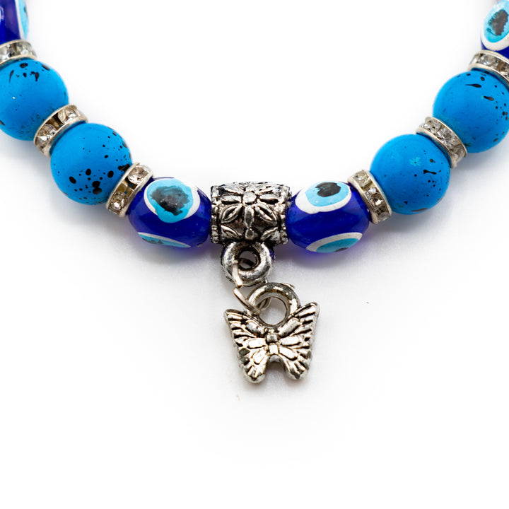 Bracelet teinté contre le mauvais œil, perle bleue de protection et nazar argenté, 8 mm