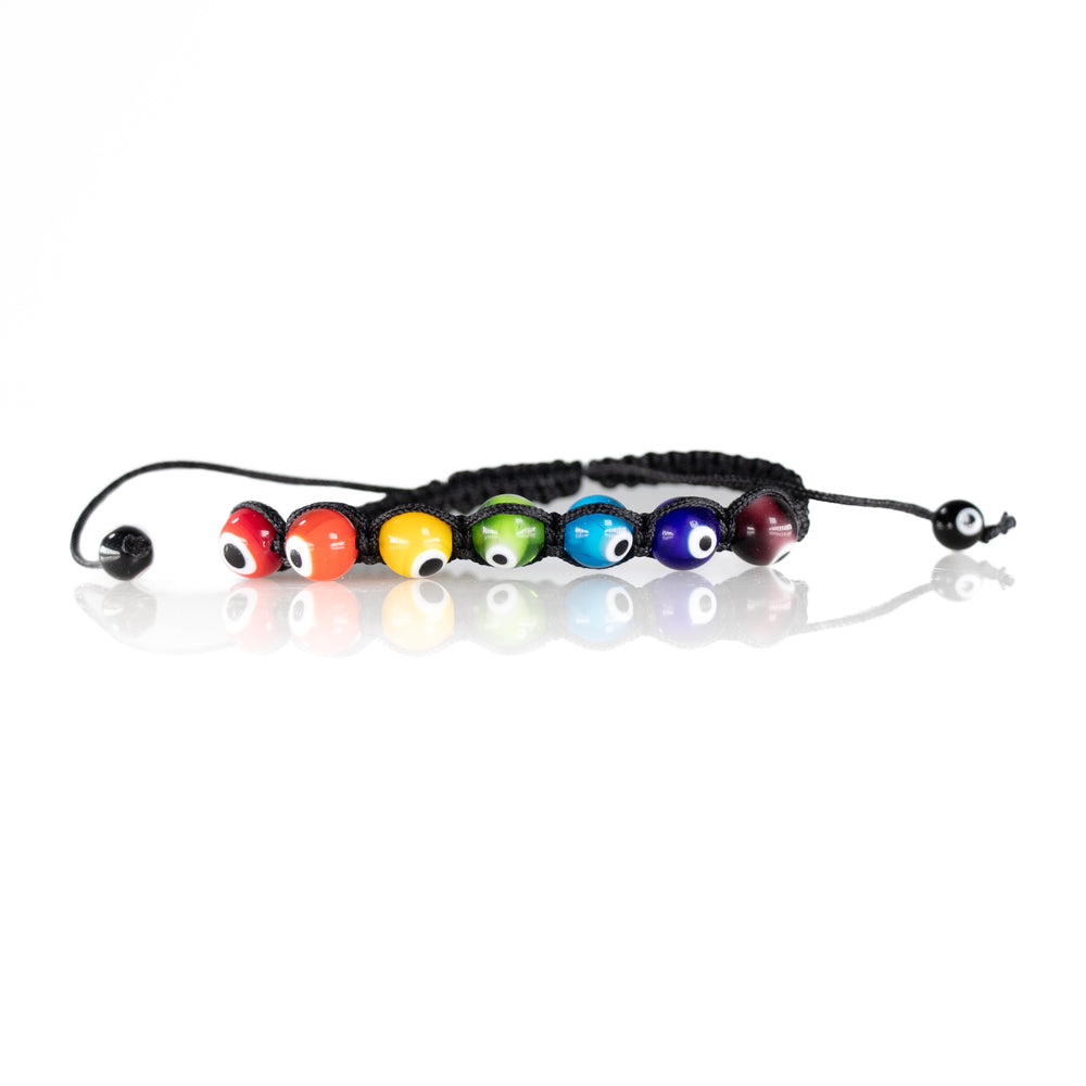 Black macrame bracelet featuring seven vibrant, rainbow-colored Evil Eye beads, including red, green, and indigo, displayed with reflections on a pristine white background