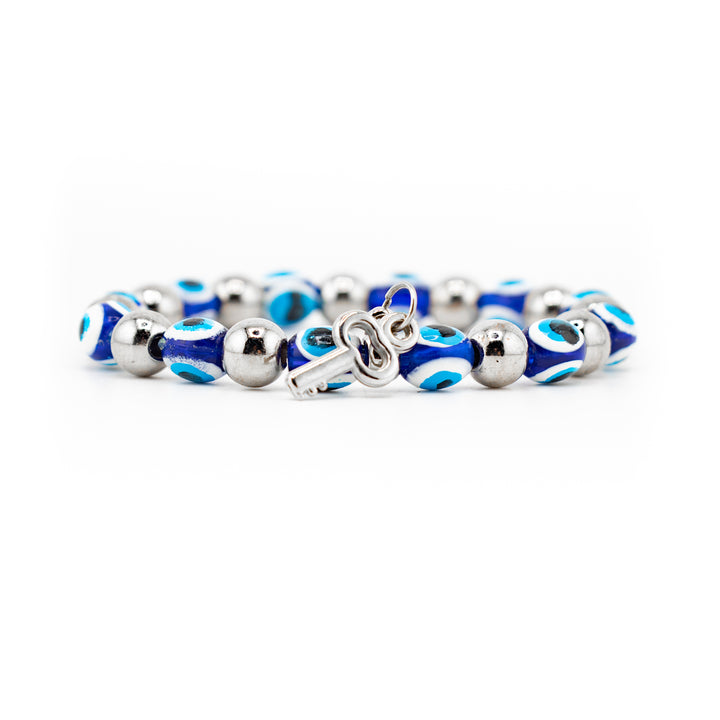 Bracelet de protection Nazar contre le mauvais œil avec perles en plastique argentées de 8 mm