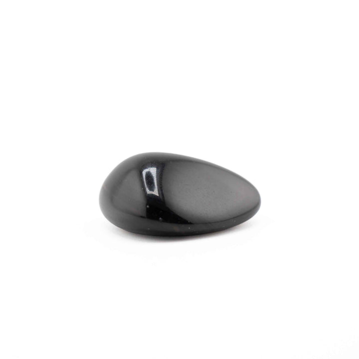 Polished Black Obsidian tumbled stone featuring a smooth, glossy surface and tear-drop shape on a white background