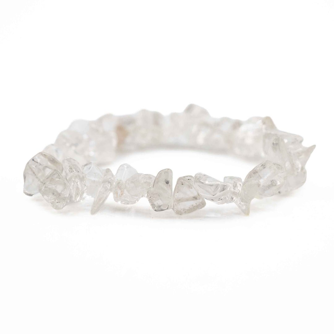 Side view resting shot of a Clear Quartz chip bracelet showing smooth, polished translucent crystal chips