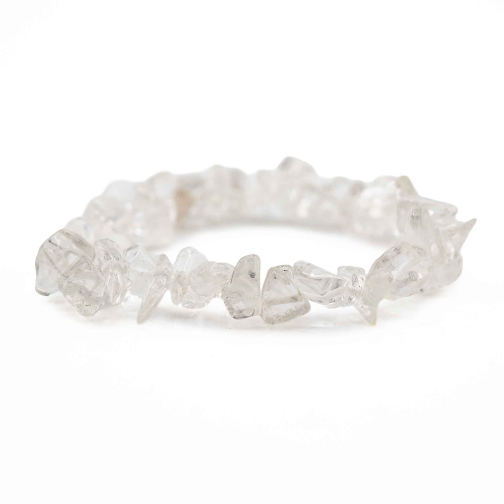 Side view resting shot of a Clear Quartz chip bracelet showing smooth, polished translucent crystal chips