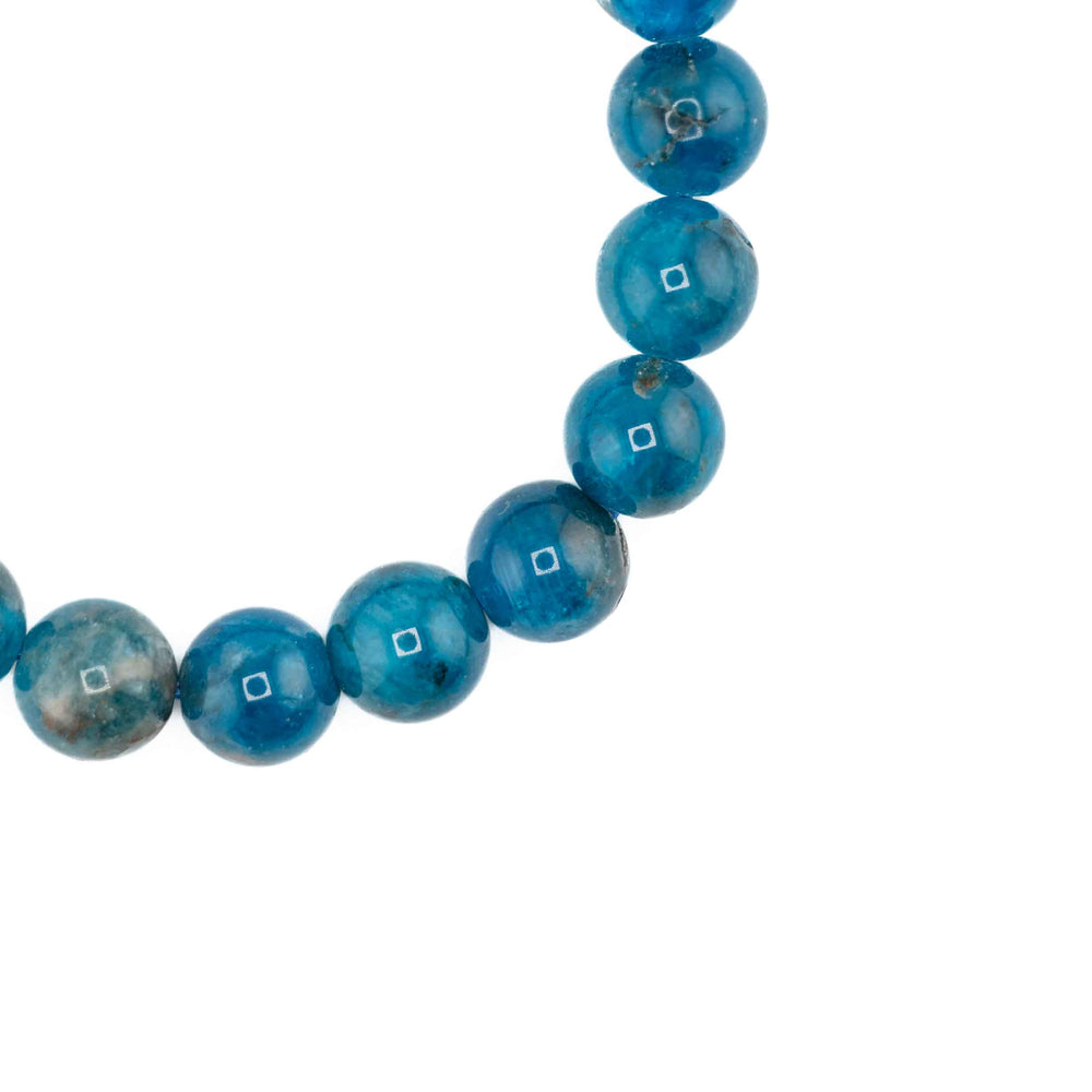 Blue beaded necklace on a white background