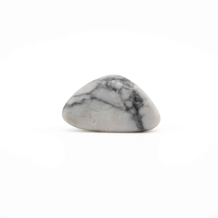 A small polished howlite stone with a smooth teardrop shape, featuring a light gray and white base with dark gray to black veining, set against a plain white background.