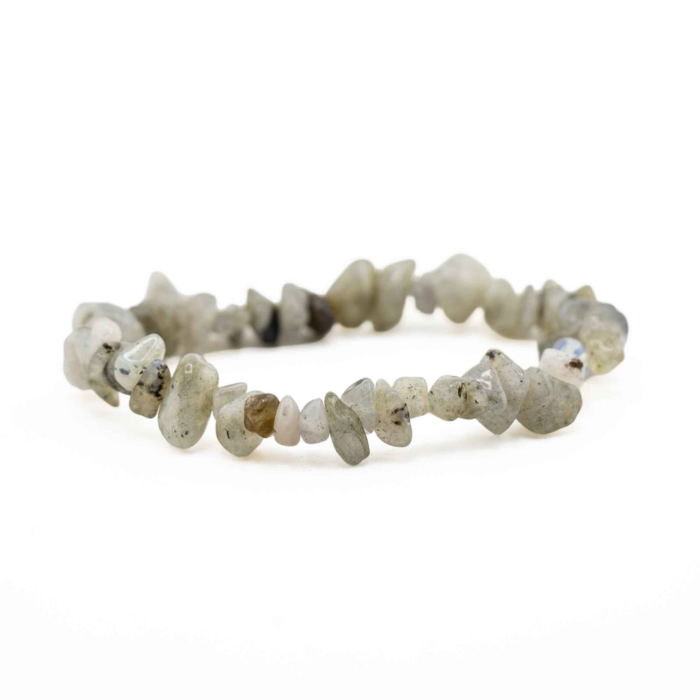 Side view resting shot of a Labradorite chip stone bracelet displaying smooth, polished greenish-grey crystal chips