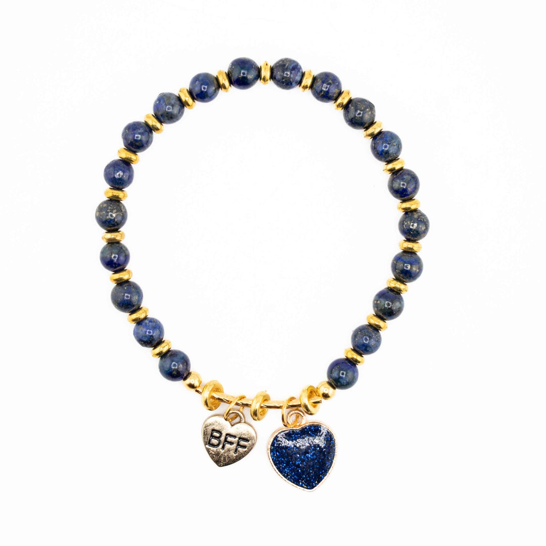 Bracelet with blue beads and gold accents on a white background