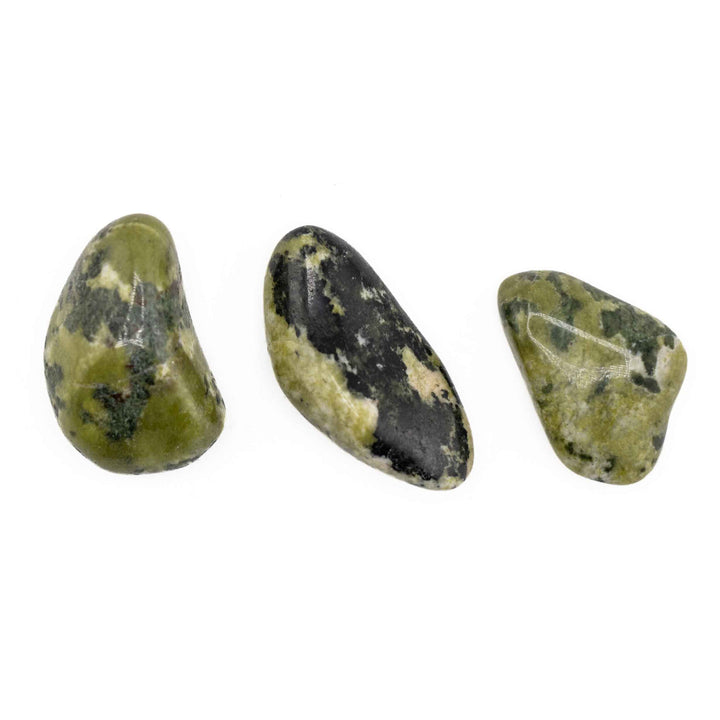 Set of three polished Nephrite Inca Jade tumbled stones showing distinct natural shapes, glossy finishes, and green mineral patterns