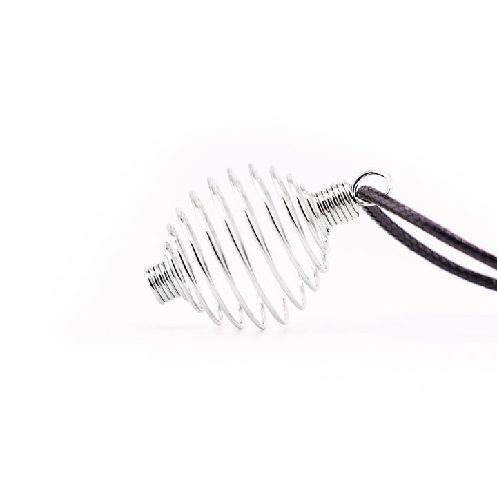 Handcrafted Metal Wire Pendant – Elegance with a Twist of Artistry