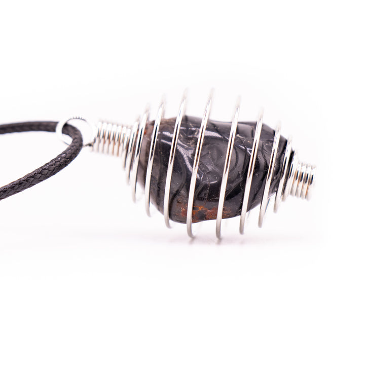 Handcrafted Metal Wire Pendant – Elegance with a Twist of Artistry