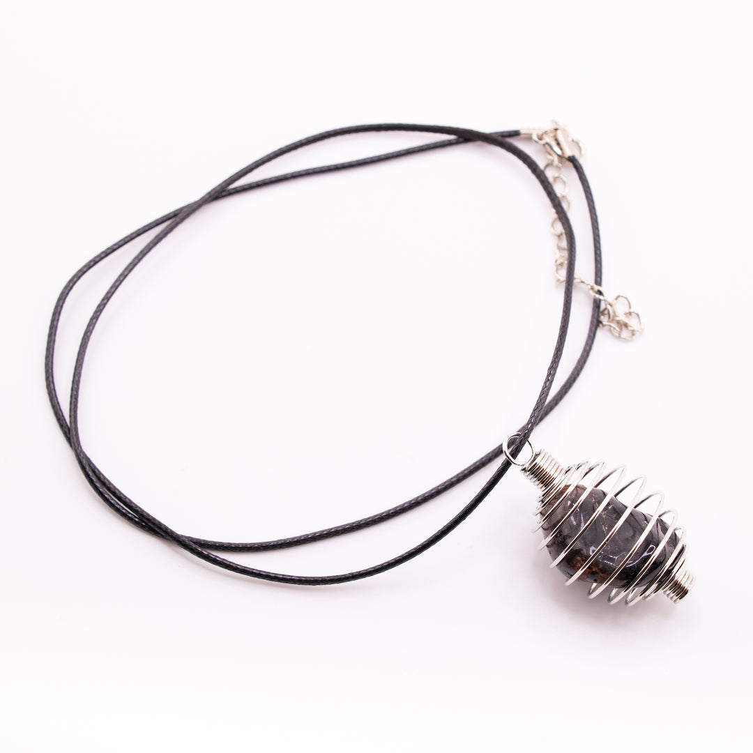 Handcrafted Metal Wire Pendant – Elegance with a Twist of Artistry