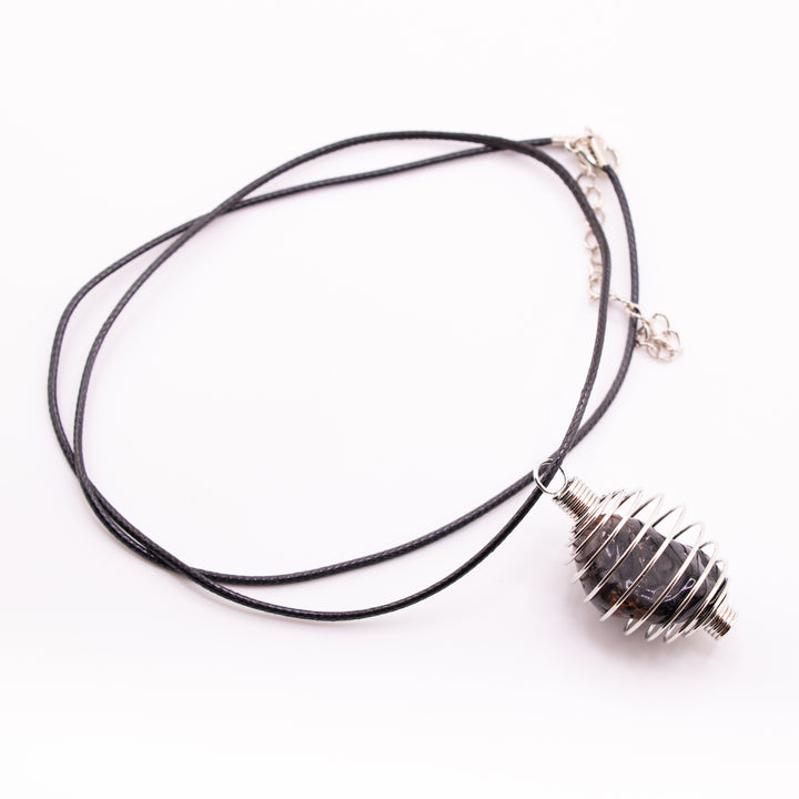 Handcrafted Metal Wire Pendant – Elegance with a Twist of Artistry