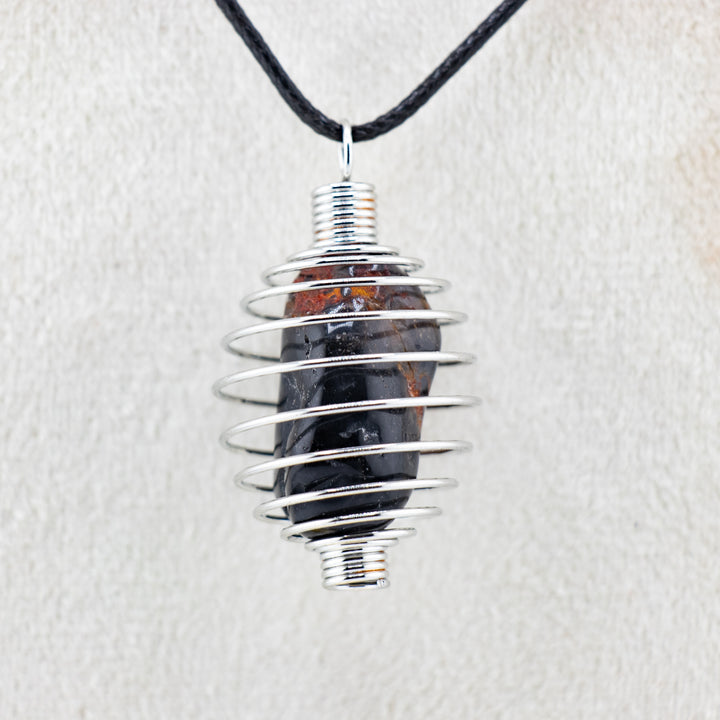Handcrafted Metal Wire Pendant – Elegance with a Twist of Artistry