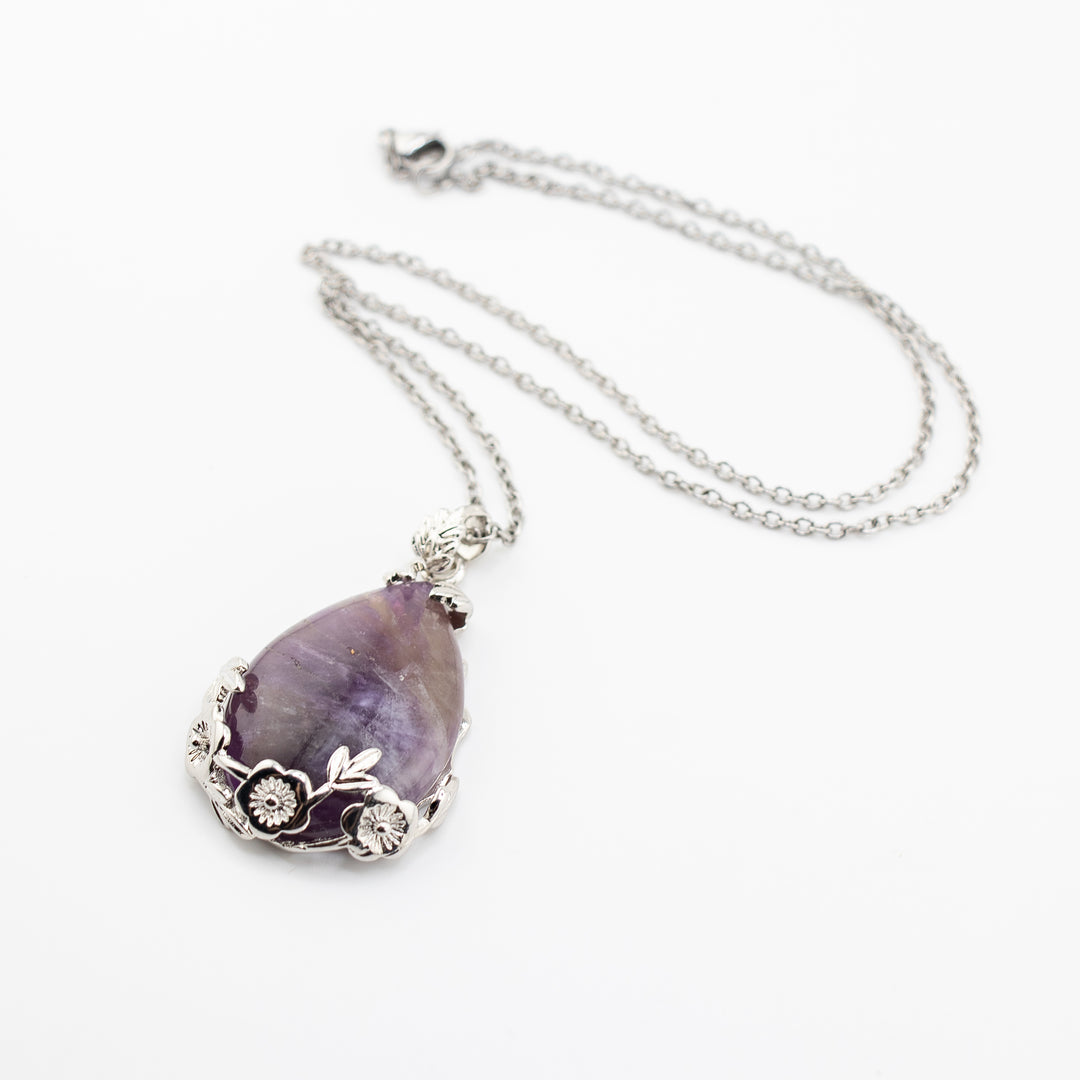 Handcrafted Teardrop Amethyst Gemstone Pendant – Serenity & Style Unearthed