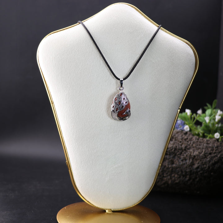 Enchanting Peacock Elegance: Synthetic Red Goldstone Teardrop Pendant Necklace