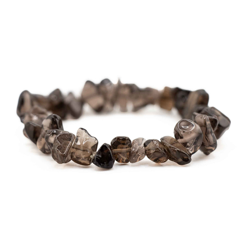 Side view resting shot of a Smoky Quartz chip stone bracelet highlighting raw-style crystal shapes and smooth polished finish