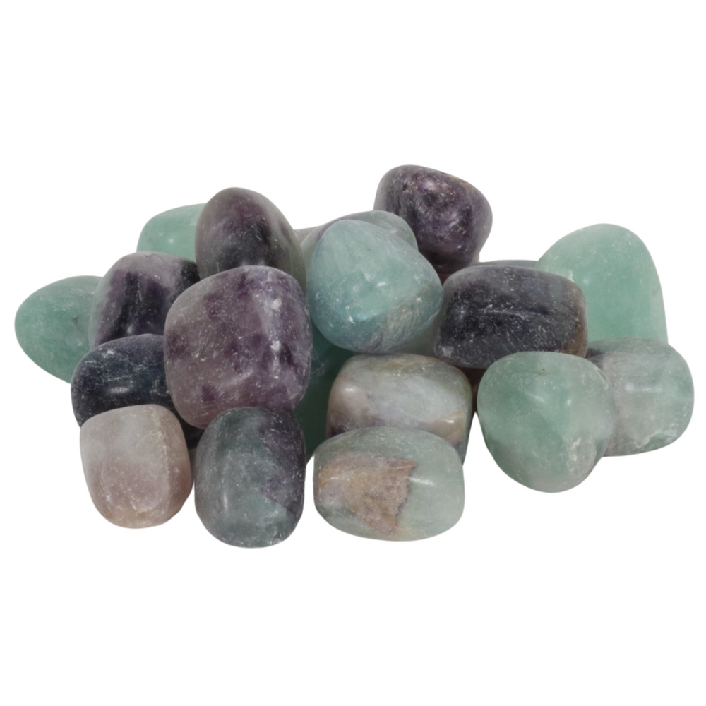 A scattered pile of smooth, tumbled fluorite gemstones showcasing translucent hues of violet purple, seafoam green, and deep blue-grey, some with subtle banding
