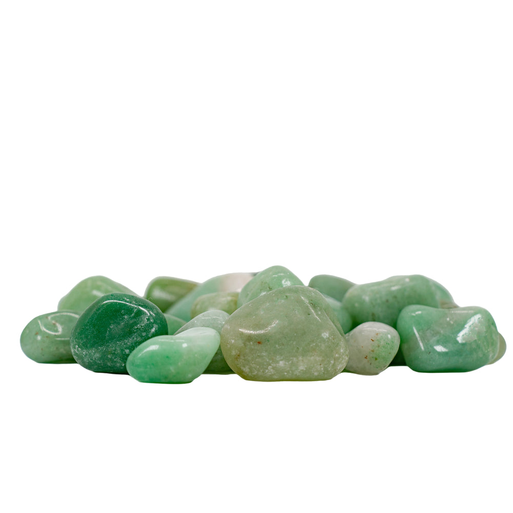 A cluster of smooth polished green stones displaying varied hues from light mint to deep forest green with some visible surface specks