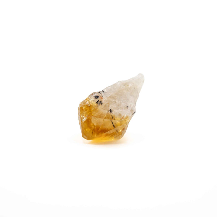 A single, rough-cut citrine crystal point displayed centrally against a plain white background.