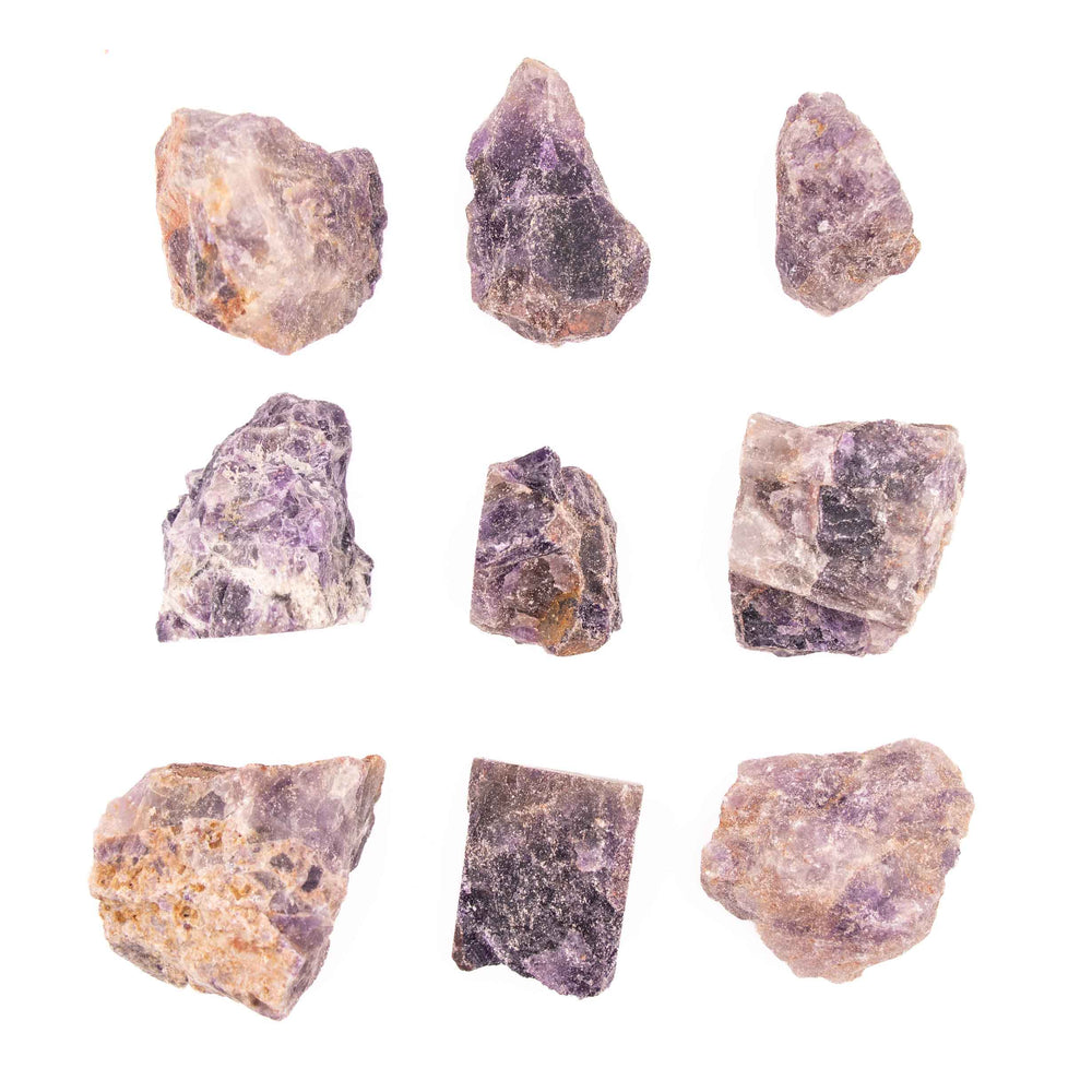 Nine raw, unpolished amethyst stones arranged in a neat 3x3 grid against a solid white background.