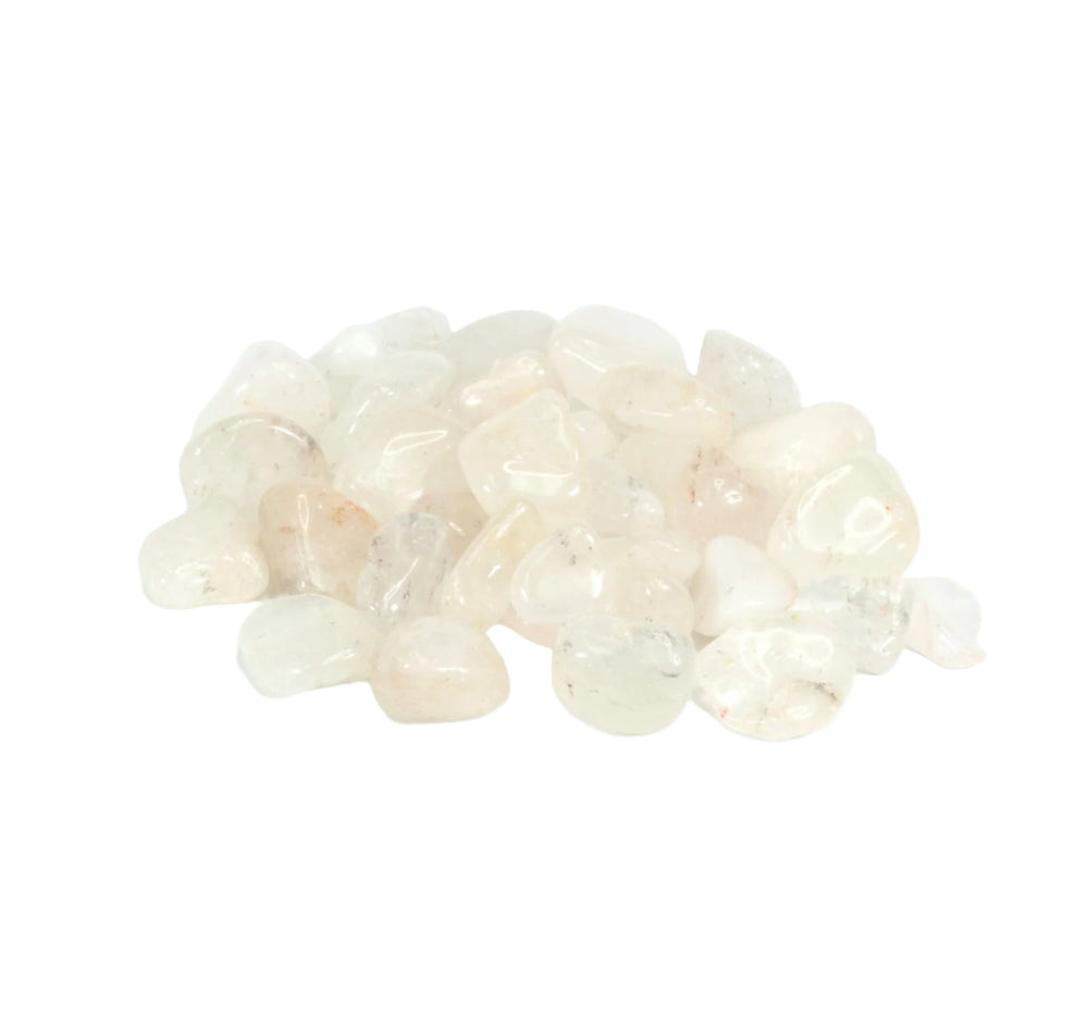 Photograph of a pile of smooth tumbled clear and milky white stones with translucent and opaque qualities showing subtle pinkish-orange and grey inclusions
