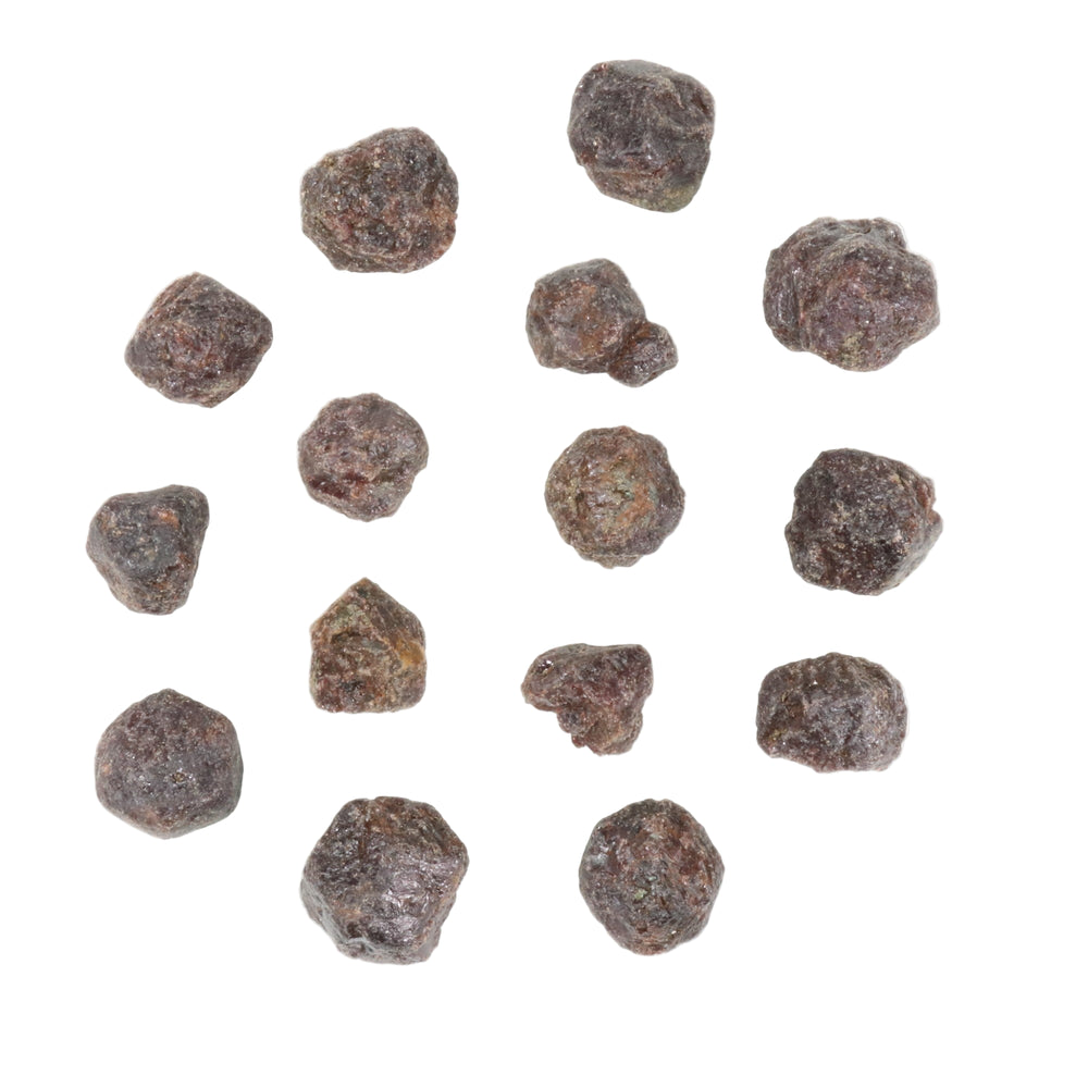 Natural rough garnets approximately fifteen dark reddish-brown mineral specimens exhibiting irregular forms and a rough granular texture isolated on a pure white background