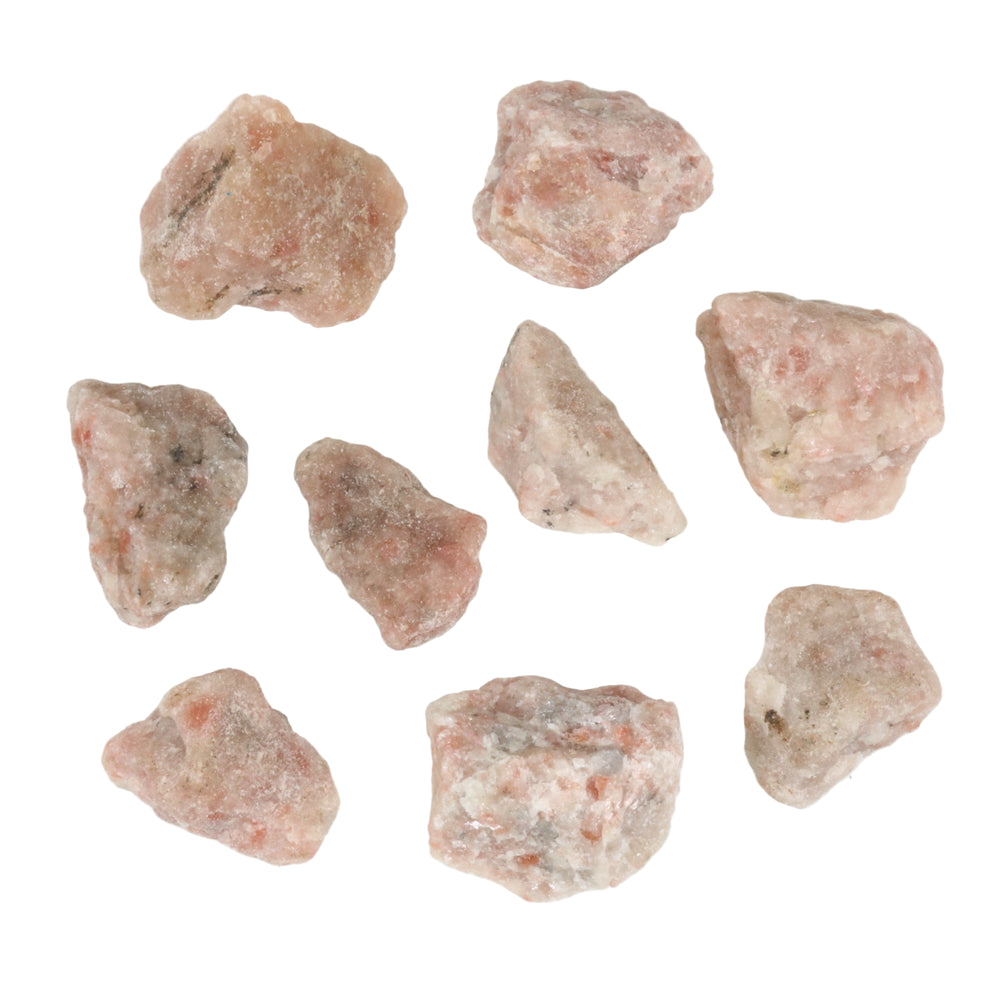 Natural sunstone pieces, multiple irregular rough nuggets showing varying shades of pale pink, peachy orange, and white with dark speckles on a clean white background