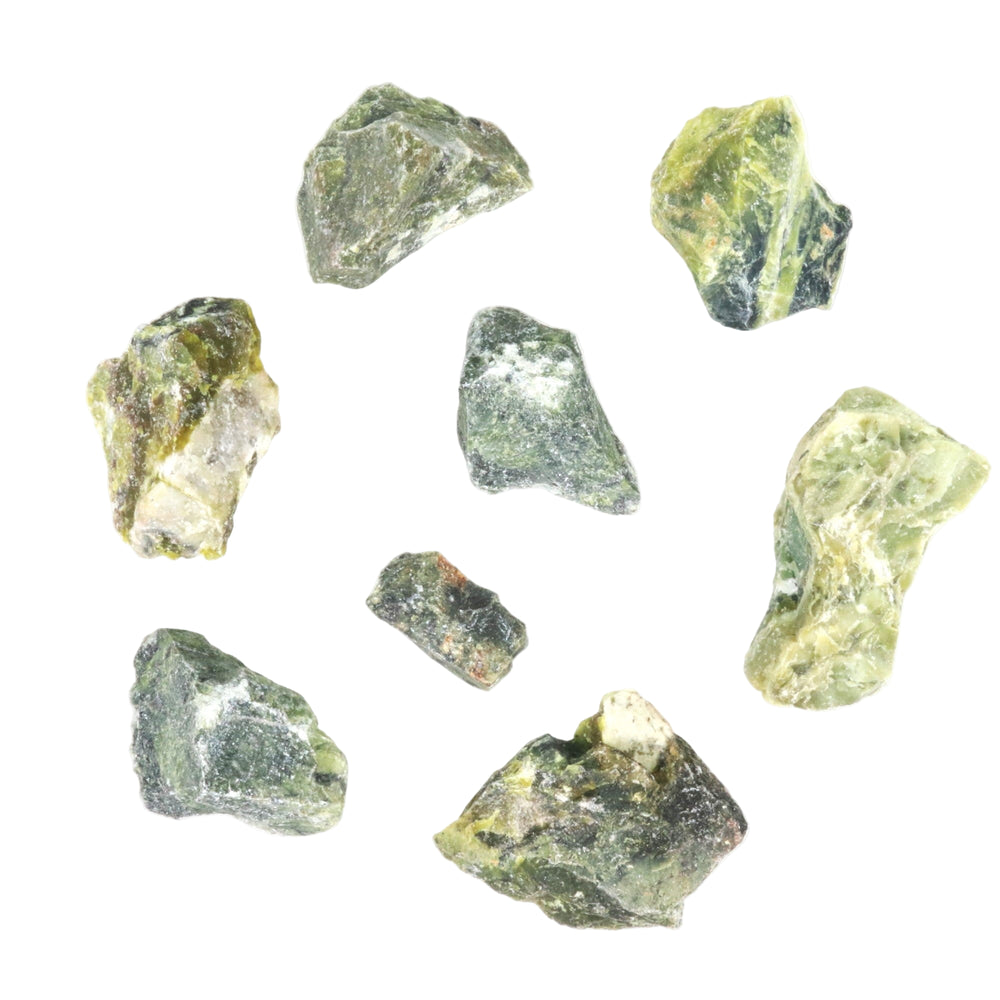 Studio photography of multiple rough natural green mineral specimens against a white background featuring varying shades from olive to dark green with white crystalline veins