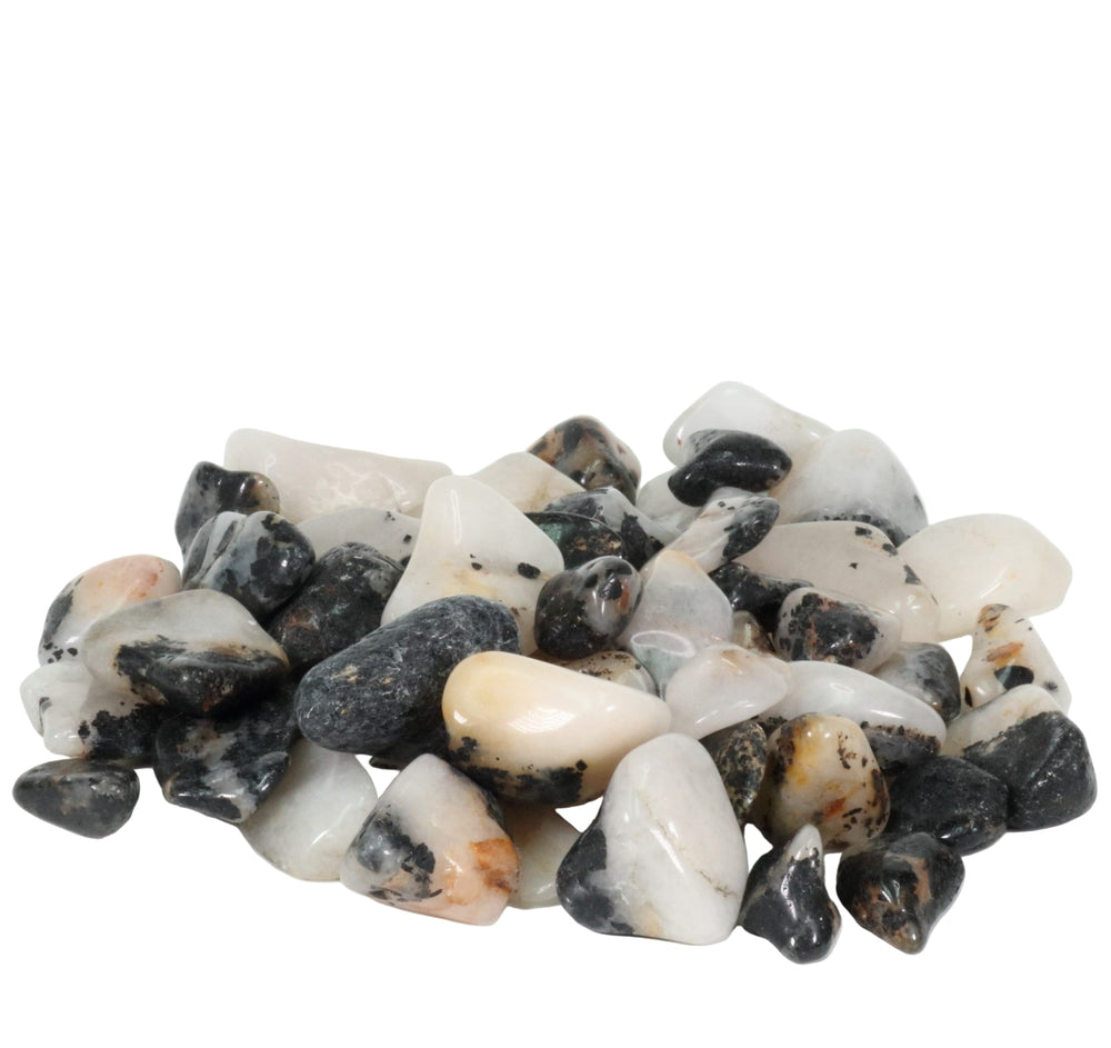 Photograph of a pile of smooth polished tumbled stones in varied shades of white, black, and gray with occasional brown and orange veining