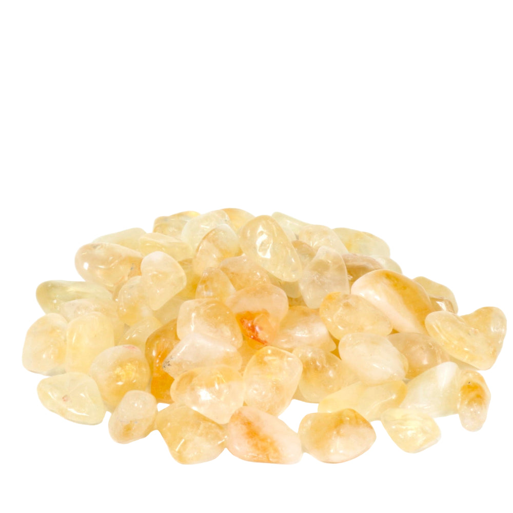 Photograph of a pile of small, smooth, tumbled citrine gemstones displaying varying translucent golden yellow and light orange hues