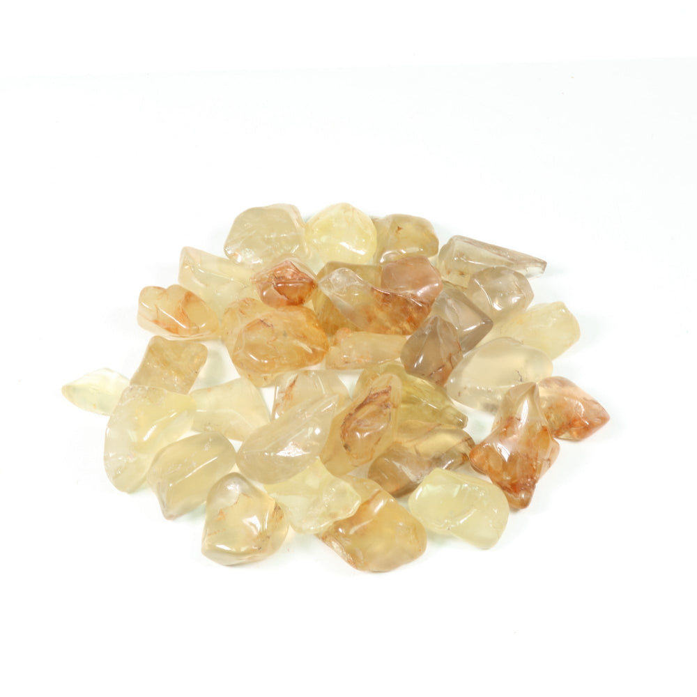 Tumbled quartz stones displaying smooth, translucent pale yellow to rich orange-brown hues with visible internal reddish inclusions on a plain white background