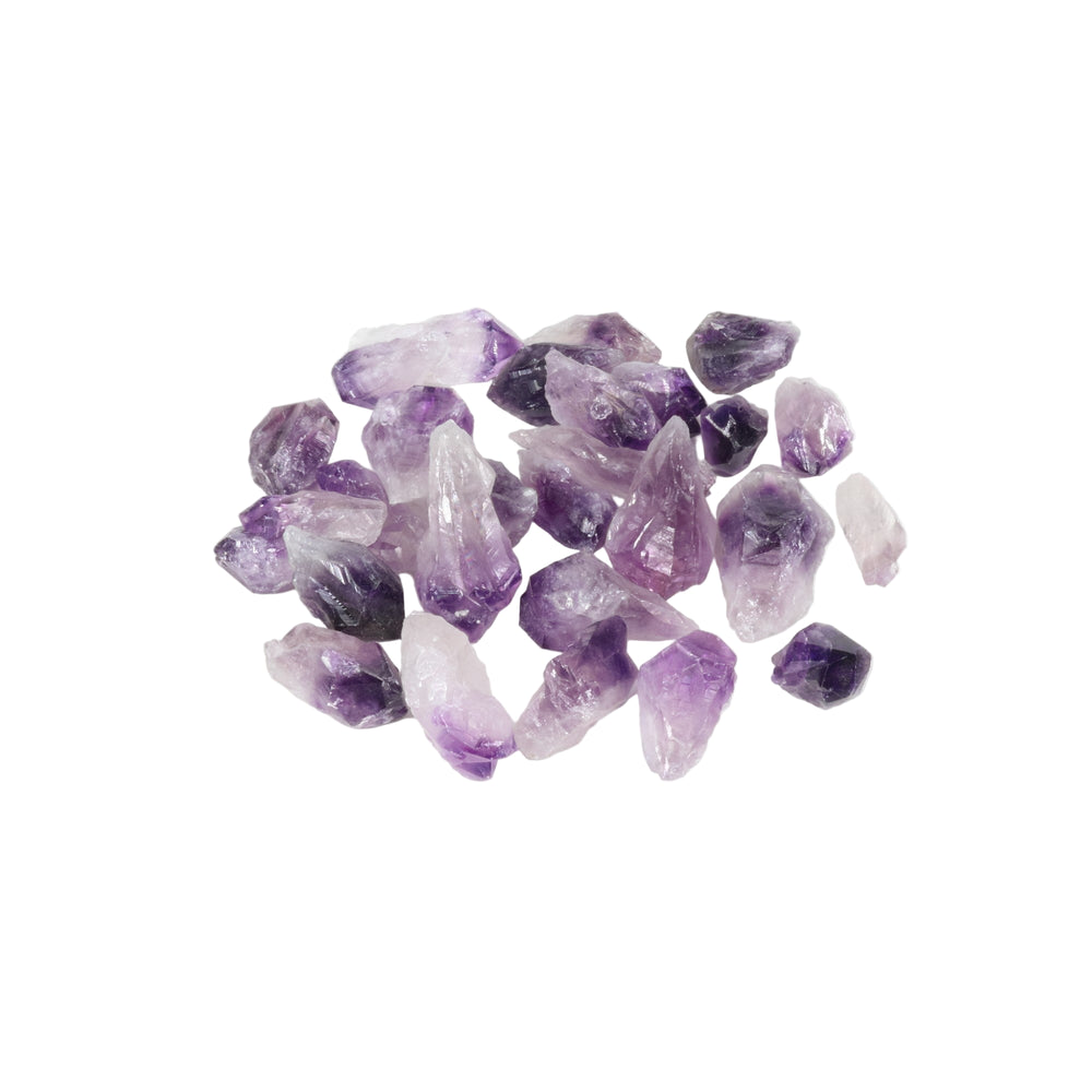 Natural raw amethyst crystals displaying vibrant purple hues and translucent white sections on a clean white background
